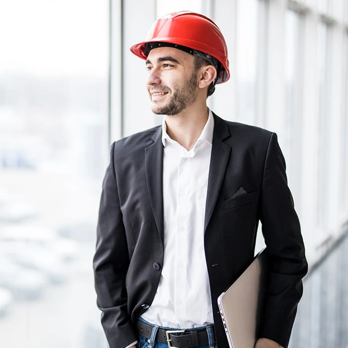 Businessman wearing hardhat