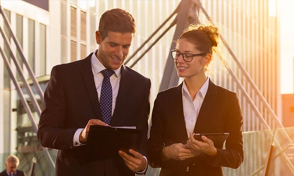 business man and business woman talking