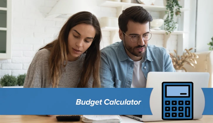 A young couple working on paperwork from their living room. The words Budget Calculator in blue banner in the foreground.