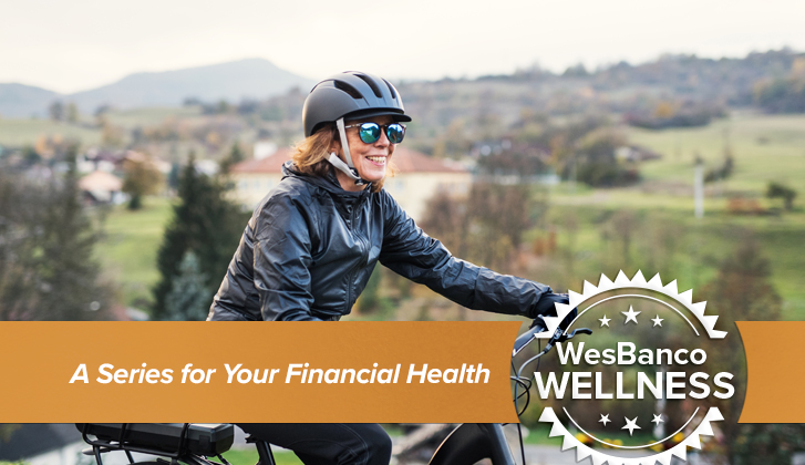 WesBanco Wellness: Woman biking through countryside