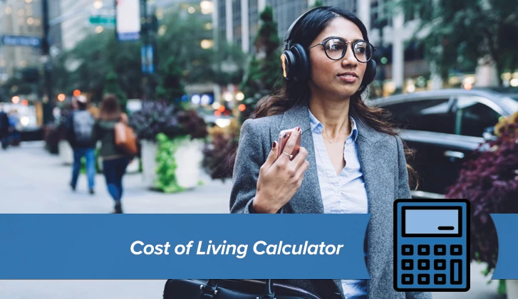 younger woman with glasses and headphones in a gray suit. The words Cost of Living Calculator in blue banner in the foreground.