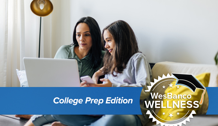 Mom and daughter review FAFSA on a laptop