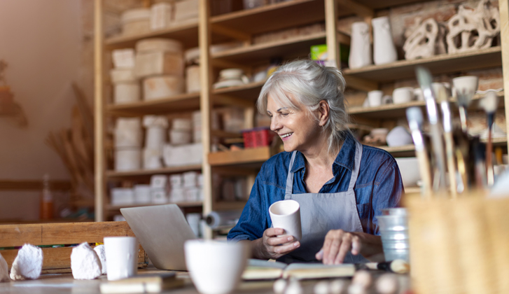 Elderly woman doing ceramics