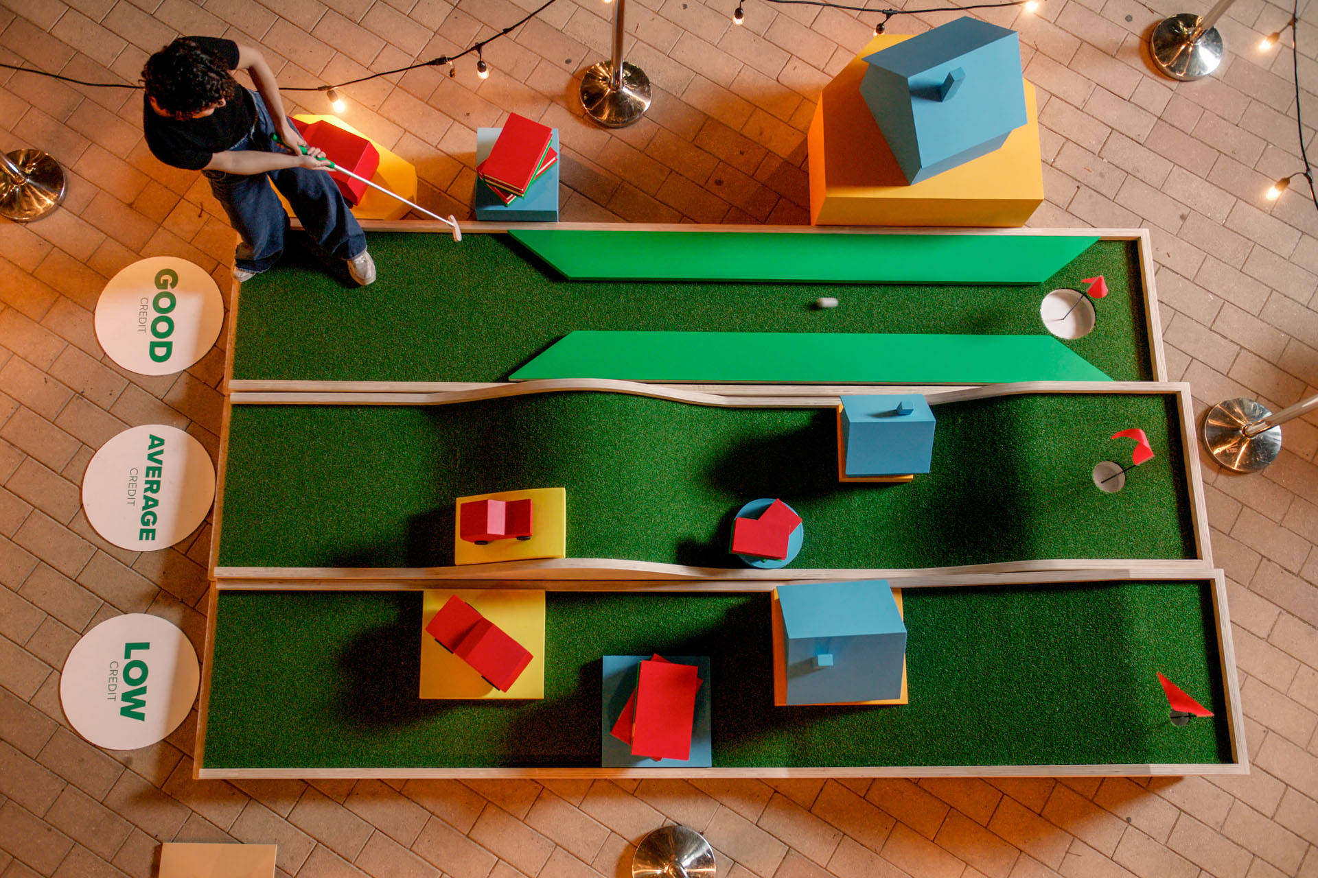 overhead view of 3 mini golf holes, labelled 