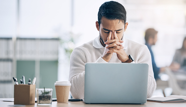 Young male, upset entrepreneur and tired business owner with burnout, upset and mental health.