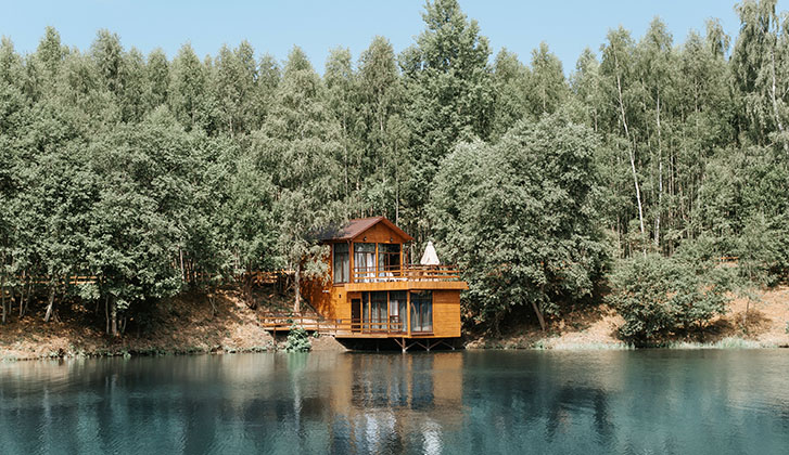 A home on the bank of a body of water.