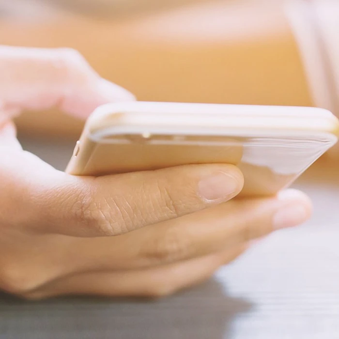 Closeup of hand holding a mobile phone
